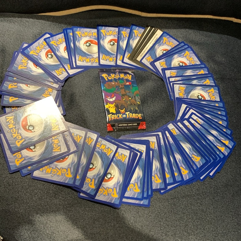 NWT Trick or Trade (3) & VEUC 76 Pokemon Cards